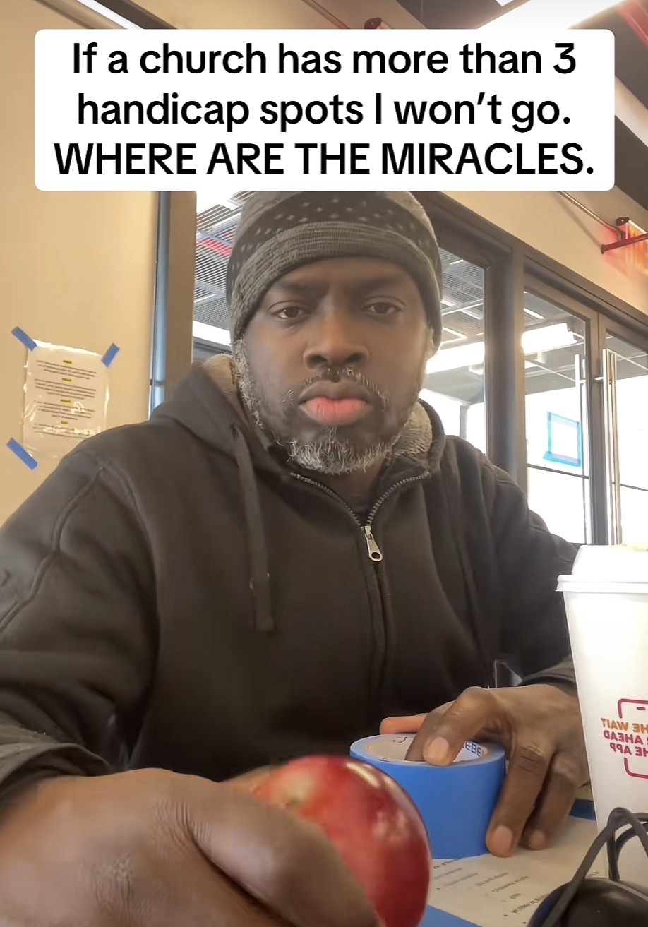 A man sitting at a counter with the caption “If a church has more than 3 handicap spots I won't go.
WHERE ARE THE MIRACLES.”
