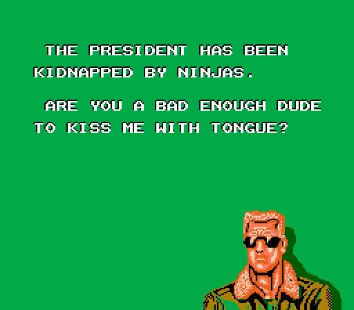Screenshot of the intro of the game *Bad Dudes versus Dragonninja* depicting a tough muscular blonde man with sunglasses.

The text reads "The president has been kidnapped by ninjas. Are you a bad enough dude to kiss me with tongue?
