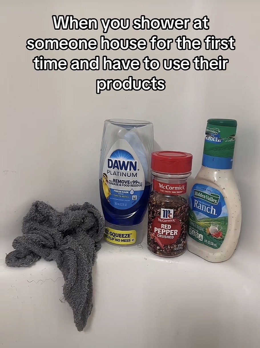 Picture of dawn dish soap, red pepper, and a bottle of ranch dressing in a shower with the caption “When you shower at someone house for the first time and have to use their products”